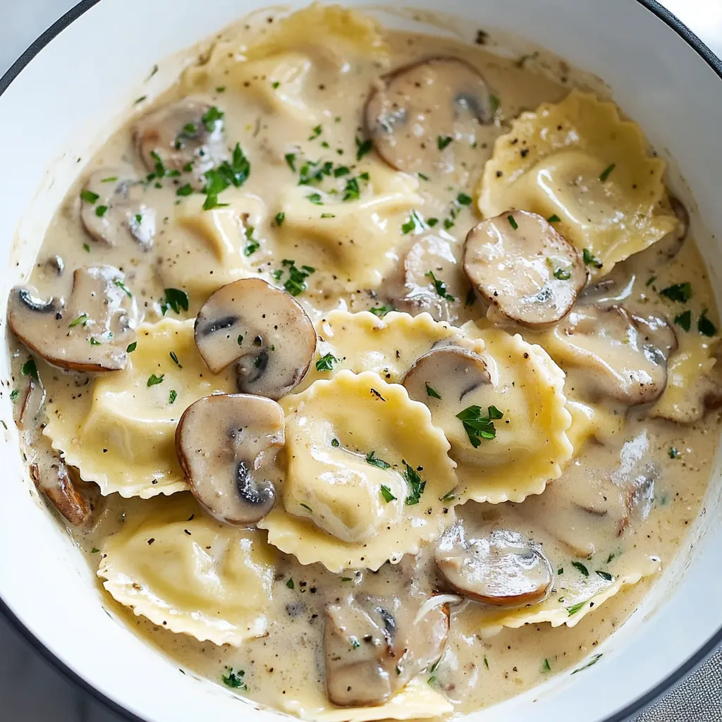 A bowl of pasta with mushrooms and herbs.
