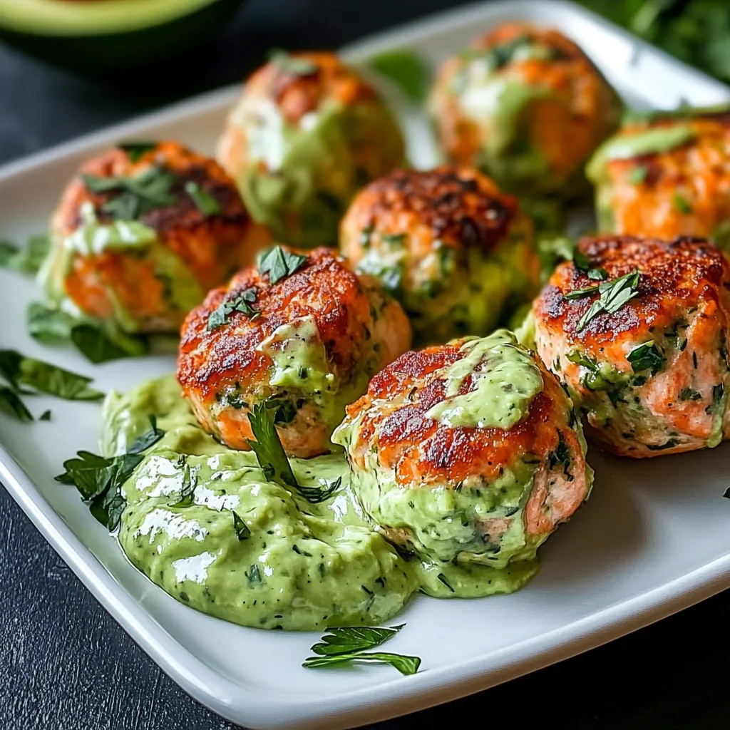 A plate of food with green sauce on it.