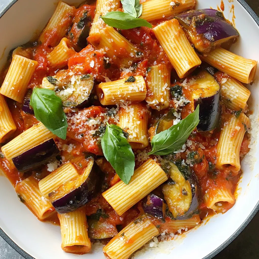 A bowl of pasta with vegetables and cheese.