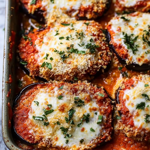 A baked dish with crispy toppings and cheese.