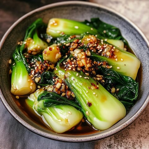 A bowl of food with green vegetables.